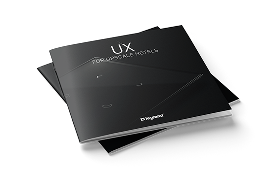 Photo d'une brochure fermée mettant en valeur les produits UX for upscale hotels de la marque Legrand.